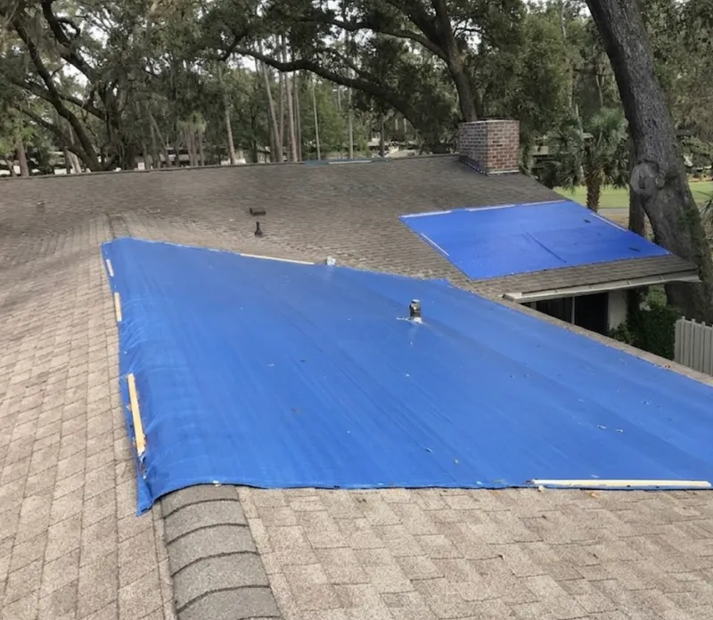 Emergency roof tarping and leak response by Real Great Roofing in Kirkland, WA — same-day storm damage stabilization for King County homeowners